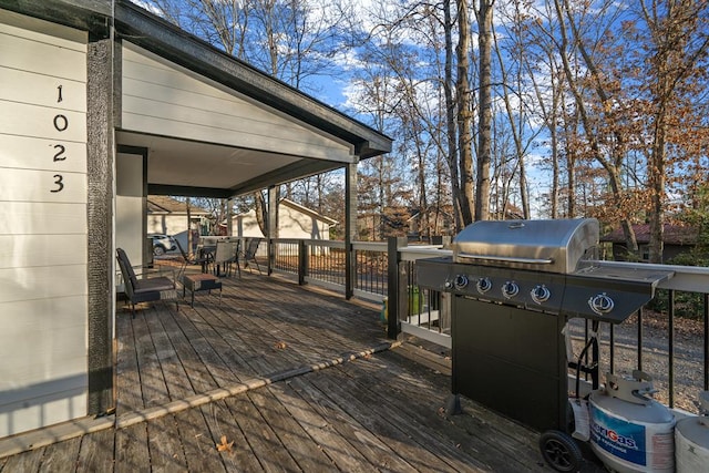 deck featuring a grill