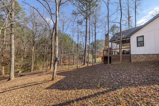 view of yard with a deck