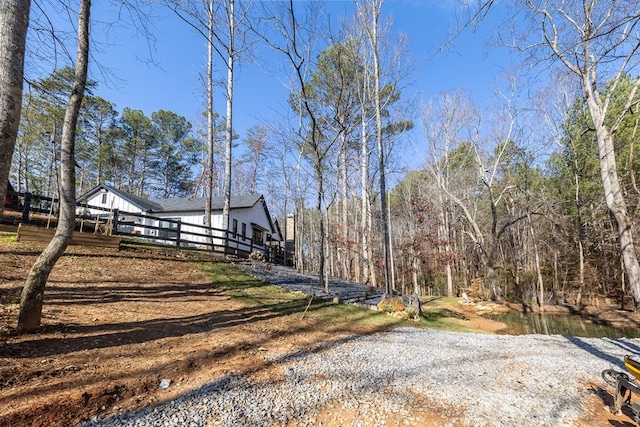 view of yard with a wooden deck