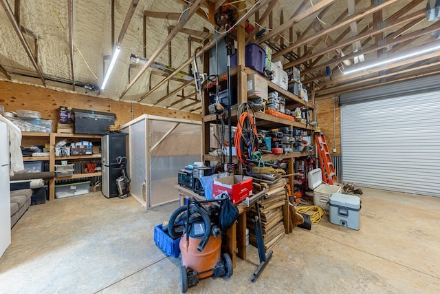 garage with a workshop area