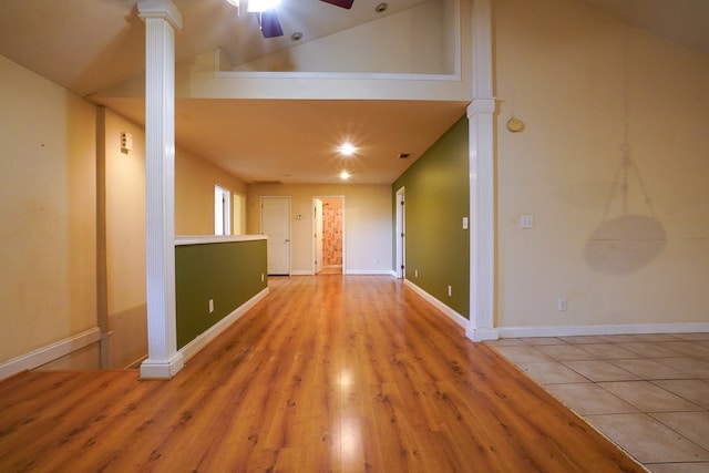 289 12 Point Rd, Blairsville, GA 30512 - unfurnished room featuring ceiling fan, wood finished floors, ornate columns, baseboards, and vaulted ceiling