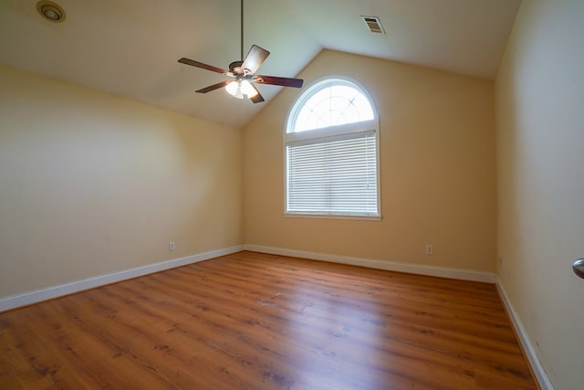 289 12 Point Rd, Blairsville, GA 30512 - spare room featuring a ceiling fan, wood finished floors, lofted ceiling, and baseboards