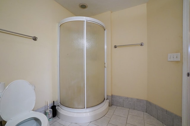 289 12 Point Rd, Blairsville, GA 30512 - full bath featuring a stall shower, toilet, and tile patterned flooring