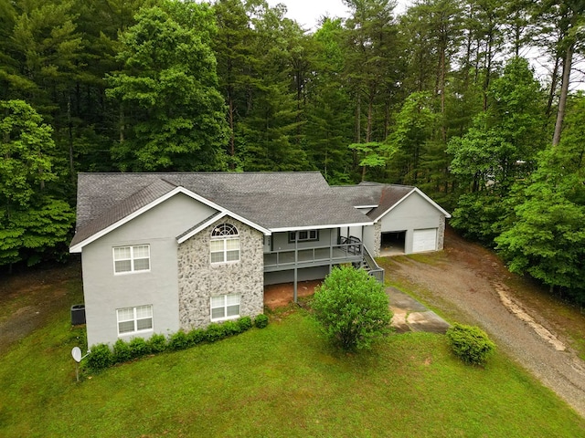 289 12 Point Rd, Blairsville, GA 30512 - view of front of house featuring a shingled roof, driveway, stucco siding, a porch, and a front lawn