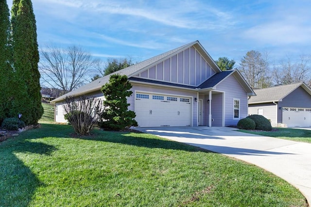 view of front facade featuring a garage and a front lawn