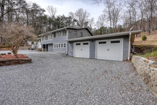 garage with driveway