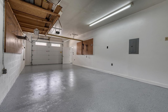 garage featuring electric panel, baseboards, a garage door opener, and concrete block wall