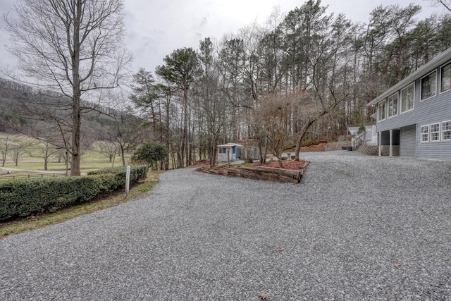 view of road with driveway