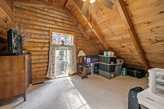 bonus room featuring lofted ceiling with beams, wood ceiling, carpet floors, ceiling fan, and rustic walls