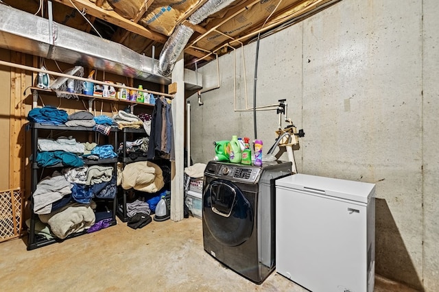 laundry room with separate washer and dryer