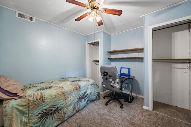 carpeted bedroom with a closet and ceiling fan