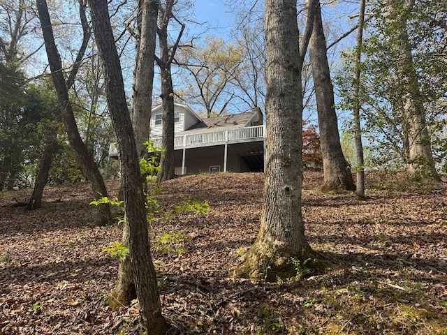 view of yard featuring a wooden deck