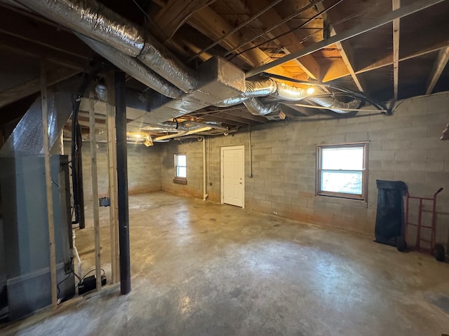below grade area featuring heating unit
