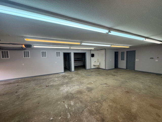 garage with baseboards