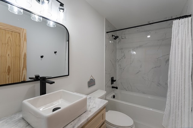 full bathroom featuring shower / bath combo, vanity, and toilet