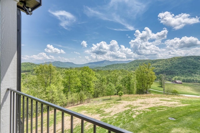 mountain view featuring a view of trees