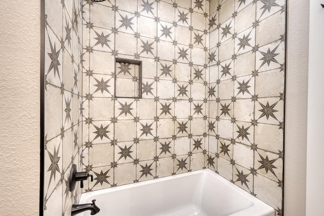 bathroom featuring a tub to relax in