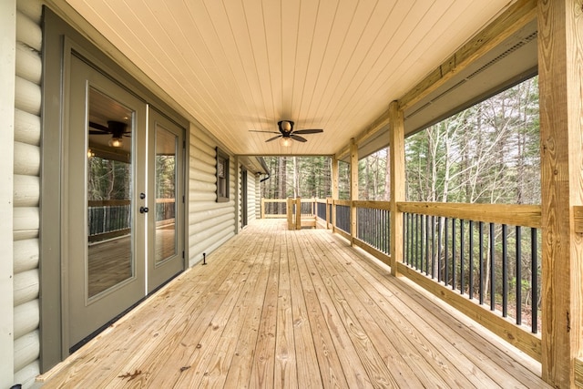 deck featuring french doors and ceiling fan