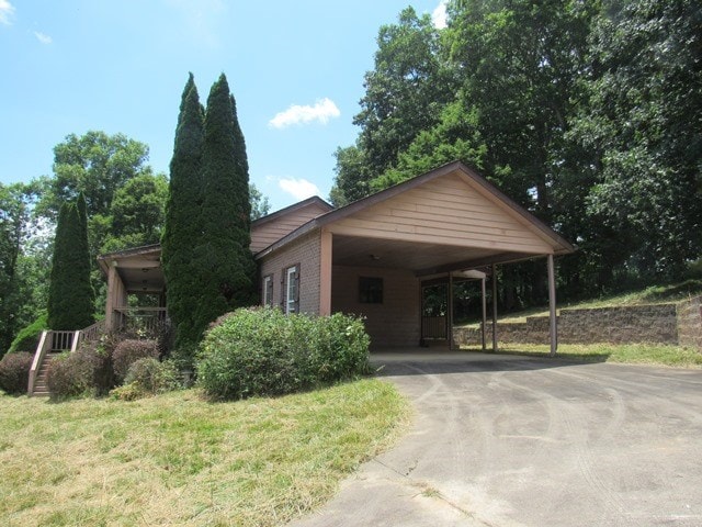 view of front facade with a carport