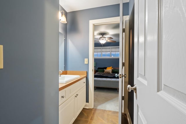 bathroom with vanity, tile patterned flooring, and ceiling fan