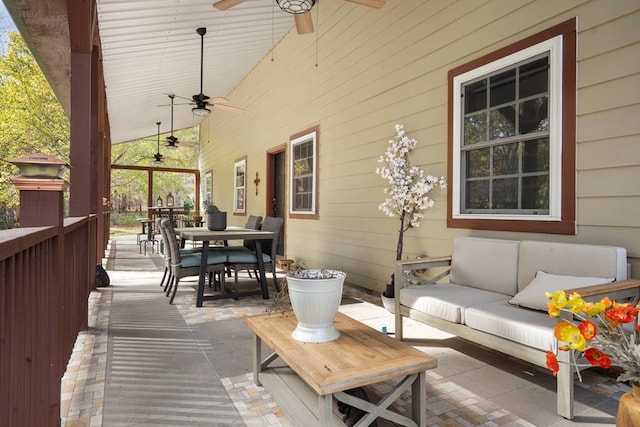 view of patio with ceiling fan and an outdoor hangout area