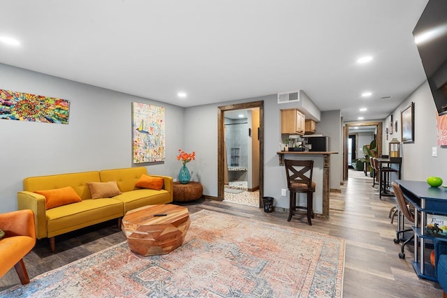 living room with hardwood / wood-style flooring