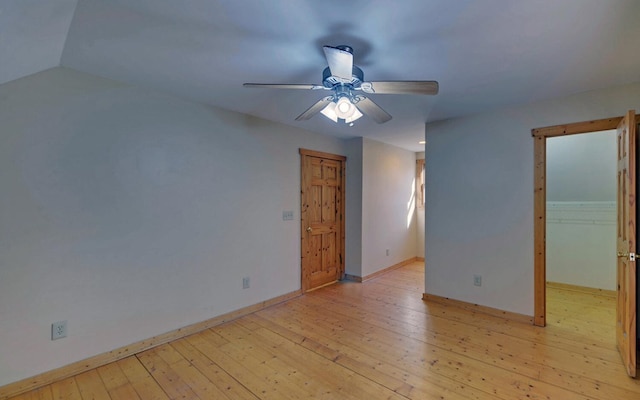 unfurnished room with ceiling fan and light hardwood / wood-style floors