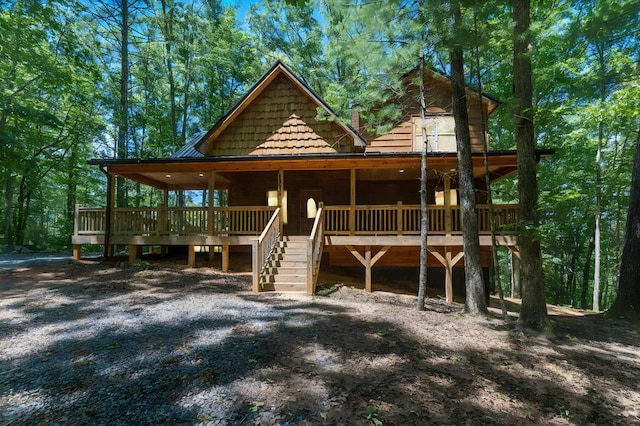 view of front of house featuring a wooden deck