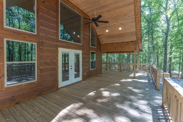 wooden deck featuring french doors and ceiling fan