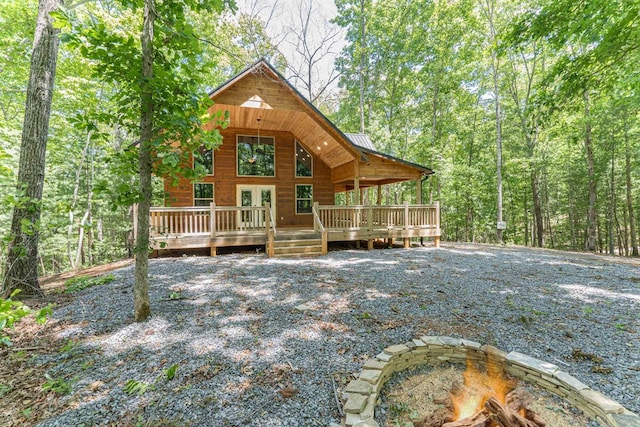 rear view of property with a deck