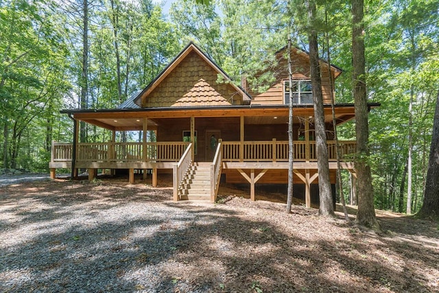 view of front of home with a wooden deck