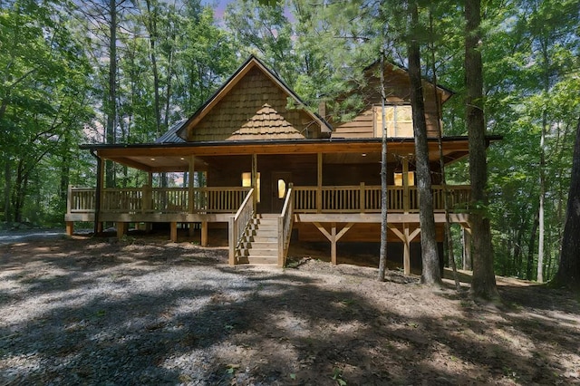 view of front of home with a wooden deck