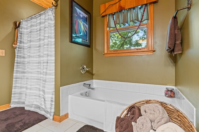 264 Summit St, Ellijay, GA 30540 - bathroom with tile patterned floors, a garden tub, and a shower with shower curtain