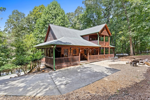 264 Summit St, Ellijay, GA 30540 - rustic home with covered porch and roof with shingles