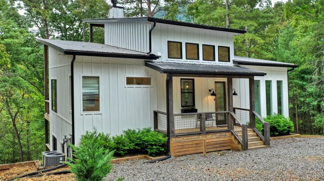 view of front of home featuring covered porch and central AC unit