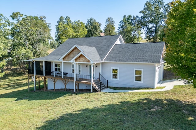21 Hogue Way, Blairsville, GA 30512 - view of front of home with a garage, a front yard, roof with shingles, a chimney, and a sunroom