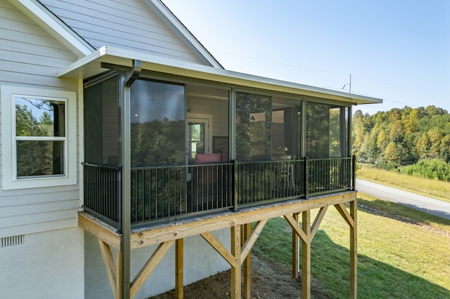 21 Hogue Way, Blairsville, GA 30512 - view of property exterior featuring a yard, crawl space, and a sunroom