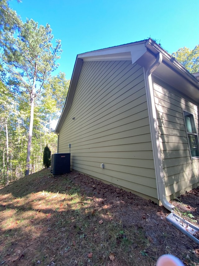 view of property exterior with central air condition unit