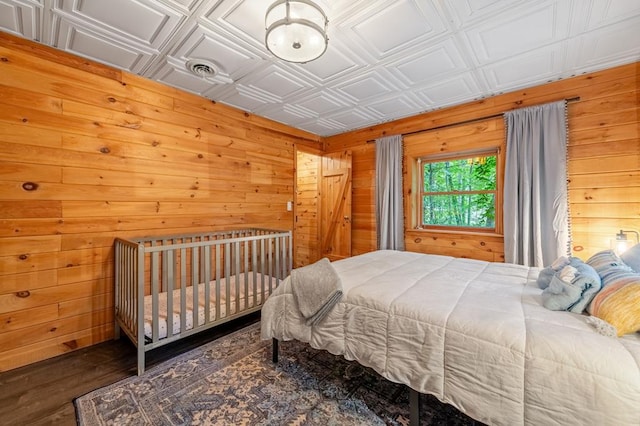 421 Weeks Creek Rd, Blue Ridge, GA 30513 - bedroom with an ornate ceiling, wood walls, and wood finished floors
