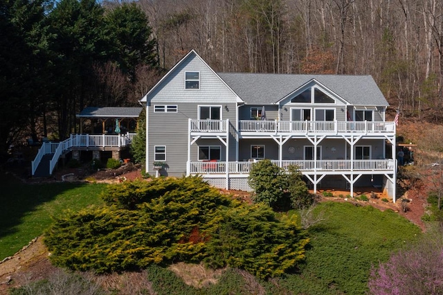 view of front of house featuring a balcony