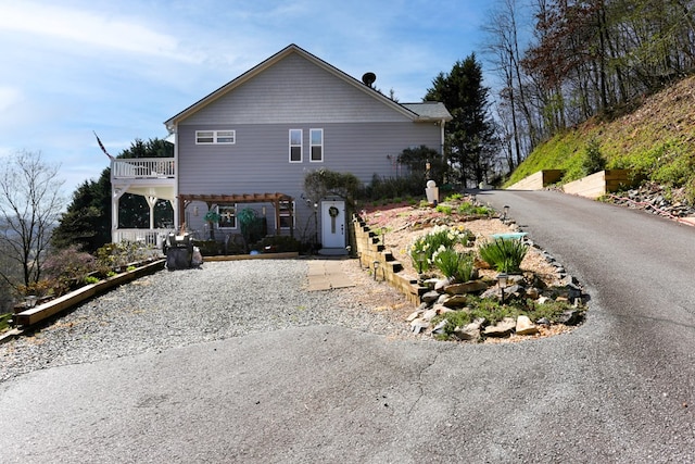 view of property exterior with a balcony