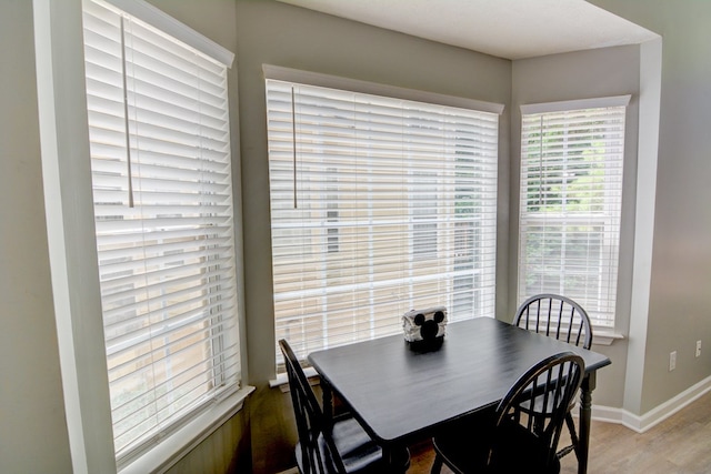 4149 Spring Cove Dr, Duluth, GA 30097 - dining room with baseboards and light wood-style floors