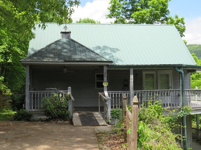 905 Johnson Rd, Hiawassee, GA 30546 - view of front of home with ceiling fan, covered porch, metal roof, and a standing seam roof