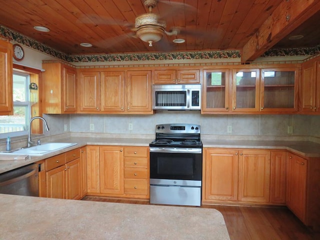 905 Johnson Rd, Hiawassee, GA 30546 - kitchen with stainless steel appliances, a sink, wood finished floors, wood ceiling, and light countertops