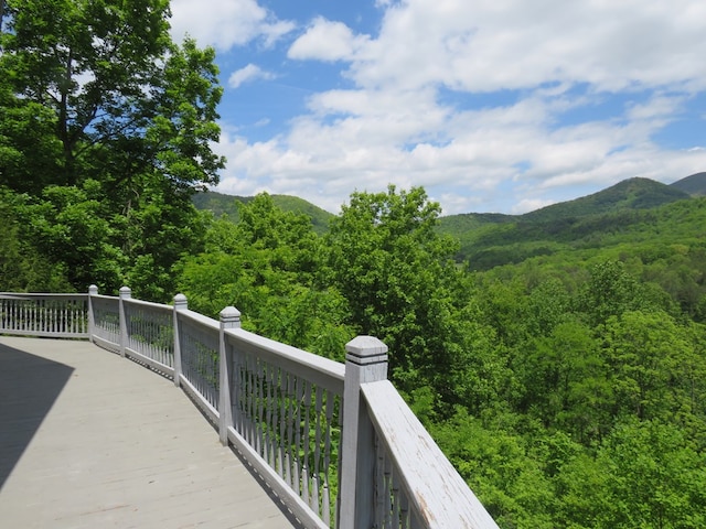 905 Johnson Rd, Hiawassee, GA 30546 - wooden terrace featuring a view of trees and a mountain view