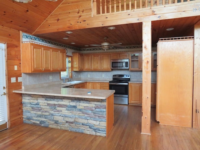 905 Johnson Rd, Hiawassee, GA 30546 - kitchen featuring appliances with stainless steel finishes, wooden ceiling, light countertops, a sink, and light wood-style floors