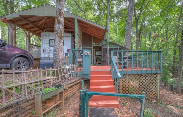 exterior space with a carport