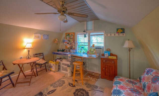 bedroom featuring lofted ceiling, light colored carpet, and ceiling fan