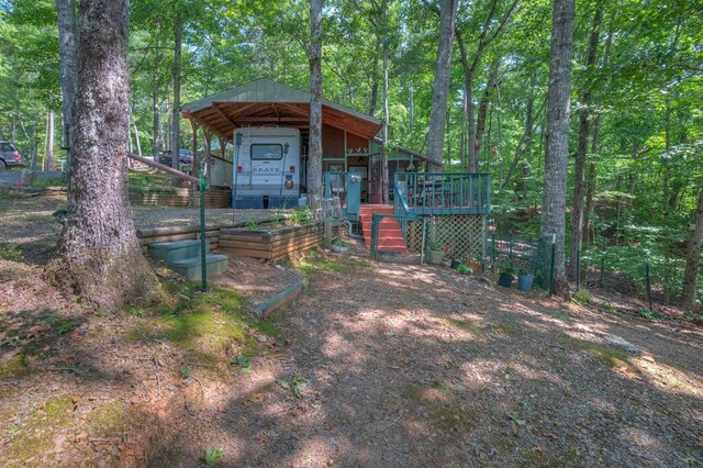 view of outdoor structure with a carport