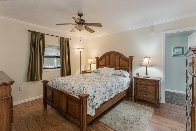 bedroom featuring dark wood-type flooring, a textured ceiling, crown molding, and ceiling fan